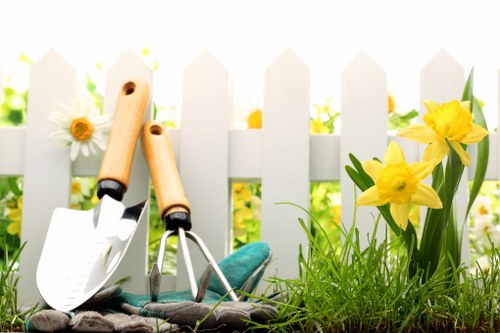 Professional landscaper installing garden features in Addiscombe